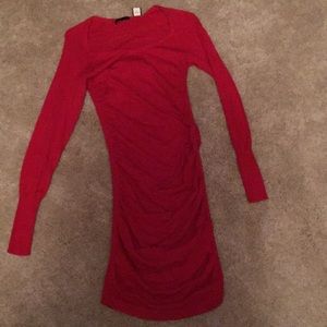 Form fitting red dress with ruching on sides